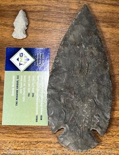 Native American Spear Point, Arrowheads and Fetishes Mounted on a Wood Plaque.