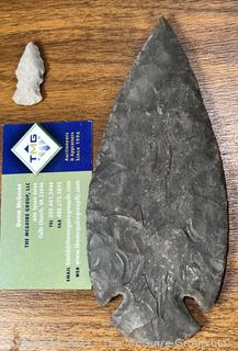 Native American Spear Point, Arrowheads and Fetishes Mounted on a Wood Plaque.