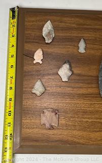 Native American Spear Point, Arrowheads and Fetishes Mounted on a Wood Plaque.