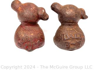 Two (2) Miniature Cast Iron Promotional Dog Paper Weights Stamped Dall B-N & Neil Pup.