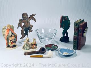 Group of Decorative Items Including Religious Hummels, Smoking Pipes and Bookends