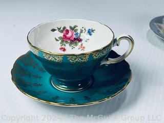 Eight (8) Hand Painted Porcelain Tea Cups and Saucers