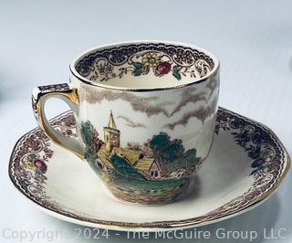 Eight (8) Hand Painted Porcelain Tea Cups and Saucers