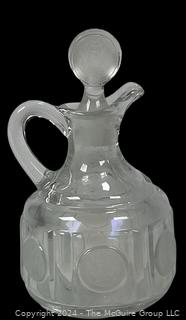 1890's American Coin Clear Glass Cruet. This was molded with real US coins until the U.S. Government made it illegal. 