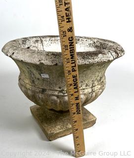 Heavy Urn Shaped Cement Planter.  First of two offered in this auction