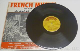 Two (2) Vinyl Records Including French Music and Jester Hairston 