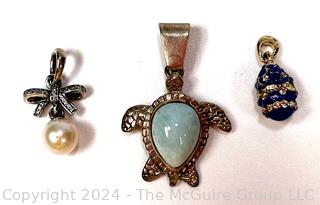 Three (3) Pendants Including Sterling Turtle, Pandora Sterling Silver Pearl and Enamel Egg