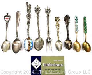 Nine (9) Souvenir Travel Spoons