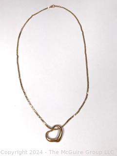 14kt Yellow Gold Floating Heart Pendant on Chain. 7.5 grams