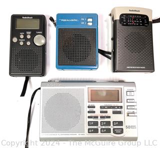 Four (4) Transistor Radios. Clean Battery Cases