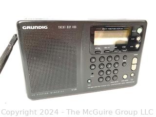 Two (2) Portable Radios Including REALISTIC & Grundig Yacht Boy YB. Clean Battery Cases  