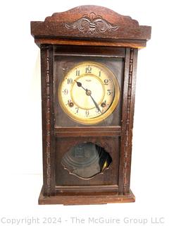 Royal Pendulum Wall Clock in Wood Case.  19" Tall