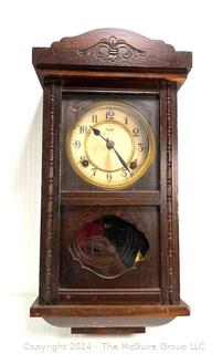 Royal Pendulum Wall Clock in Wood Case.  19" Tall