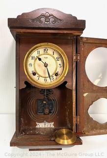 Royal Pendulum Wall Clock in Wood Case.  19" Tall