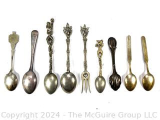 Nine (9) Souvenir Travel Spoons