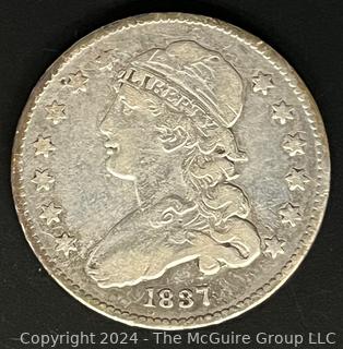 1837 Capped Bust Silver Quarter Dollar Coin. Note there is a die crack on the Reverse in STATES 