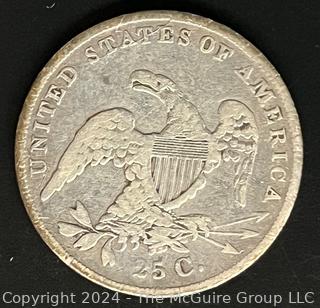 1837 Capped Bust Silver Quarter Dollar Coin. Note there is a die crack on the Reverse in STATES 