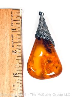 Large Amber Pendant with Ornate Silver Mount. 3" long, 31.6 grams