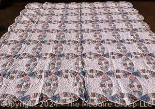 Hand Stitched Double Wedding Ring Quilt Made by Arch Quilts.