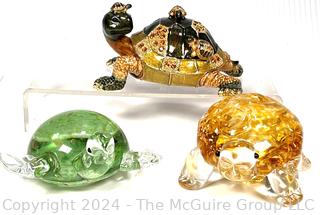 Three (3) Decorative Turtles Including Lenox Blown Glass Paperweights and Enamel Painted Trinket Box.  