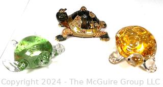 Three (3) Decorative Turtles Including Lenox Blown Glass Paperweights and Enamel Painted Trinket Box.  