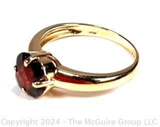 14kt Yellow Gold with Mounted Garnet Solitaire Ring. Total Weight 2.5 grams