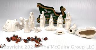 Twelve (12) Piece White Ceramic Nativity Set and South American Miniature Clay Creche 