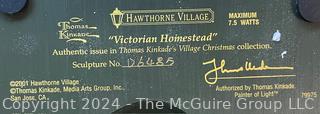 (4) Lighted Buildings of Hawthorne Village Thomas Kinkade's Christmas Collection in Original Styrefoam: Village Post Office (#A5769) Light of Hope Church (#40949) Victorian Homestead (#D6485) Santa's Workshop Toys (#D8749)