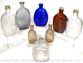 Eight (8) Glass Whiskey Flasks