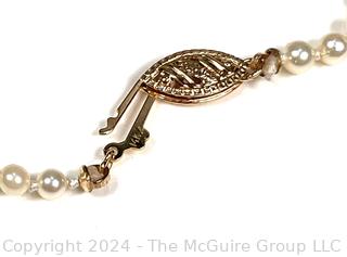 Knotted Pearls with 14kt Gold Clasp. 20" long