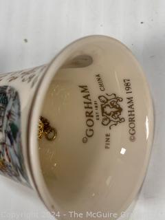 Nine (9) Gorham Fine China Annual Christmas Bells (1981-1987)