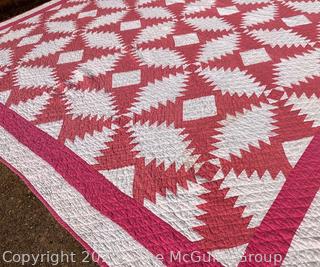 Hand Stitched Pink and White Quilt in the Pineapple Pattern. 73" x 85"