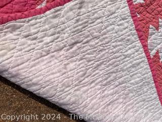 Hand Stitched Pink and White Quilt in the Pineapple Pattern. 73" x 85"