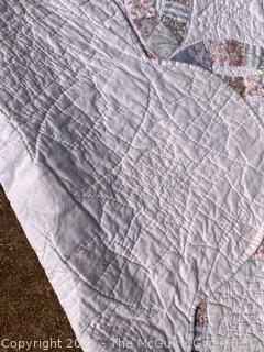 Hand Stitched Double Wedding Ring Quilt Made by Arch Quilts.