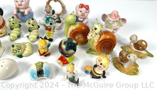 Collection of Ceramic Character Decorative Items Including Shakers