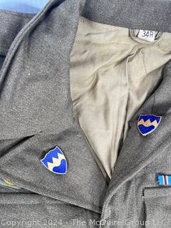 WWII Army Combat Medic Jacket with Theater Patches, Insignia & Ribbons, including Silver Star & Purple Heart, 104th Infantry Division Patch "Timberwolf" and Post-Service Patches