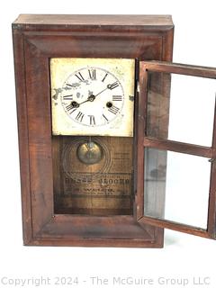 30 Hour Brass Case Wall Clock Manufactered by E.N. Welch, Forestville, CT. 