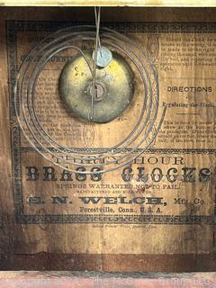 30 Hour Brass Case Wall Clock Manufactered by E.N. Welch, Forestville, CT. 