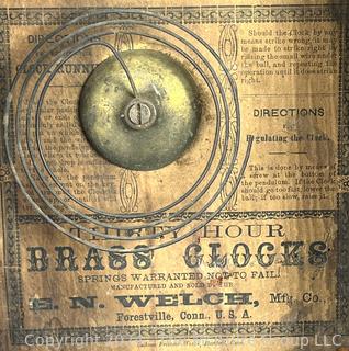 30 Hour Brass Case Wall Clock Manufactered by E.N. Welch, Forestville, CT. 