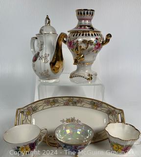 Collection of Porcelain Coffee Pots, Tea Cups and Trays