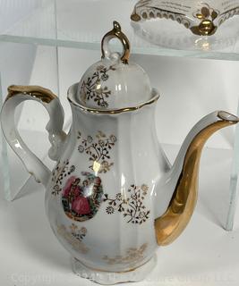 Collection of Porcelain Coffee Pots, Tea Cups and Trays