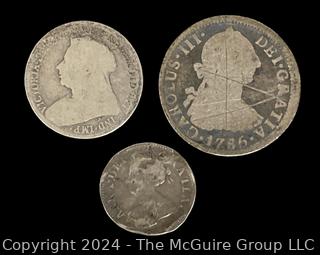 Foreign: (3) Silver Coins Including 1786 Mexico Colonial 2 Reales and 1704 Unidentified Coin 