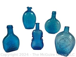 Five (5) Blue Glass Decorative Bottles