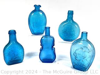 Five (5) Blue Glass Decorative Bottles