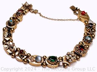 Antique 14k Yellow Gold Slider Charm Bracelet with Gemstones.  Second of three offered in this auction. 