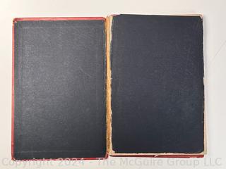 "The Hunting of the Snark: An Agony in Eight Fits" by Lewis Carroll. 

London: MacMillan and Co., 1876. xi,(3),83 pp. 12 mo. Dark Red Front and Rear Boards with Gilt Pictorial Illustrations by Henry Holiday. All edges gilt. Original black endpapers. Printed in London by R. Clay Sons & Taylor. Half title. One old ownership signature. Original plate tissue on Title Page. Last unnumbered leaf contains advertisements for Carrol's other works. A First Edition, this Issue Contains "Baker" for "Butcher" on p83. A fantastical poem involving a strange crew of tradesmen and a beaver as they set off on a journey to find "the Snark". 

1876 First Edition, 17th Printing of 1,000 {Description Updated 9/19/24 at 4:27pm ET}