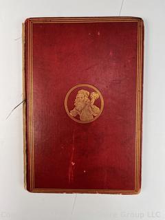 "The Hunting of the Snark: An Agony in Eight Fits" by Lewis Carroll. 

London: MacMillan and Co., 1876. xi,(3),83 pp. 12 mo. Dark Red Front and Rear Boards with Gilt Pictorial Illustrations by Henry Holiday. All edges gilt. Original black endpapers. Printed in London by R. Clay Sons & Taylor. Half title. One old ownership signature. Original plate tissue on Title Page. Last unnumbered leaf contains advertisements for Carrol's other works. A First Edition, this Issue Contains "Baker" for "Butcher" on p83. A fantastical poem involving a strange crew of tradesmen and a beaver as they set off on a journey to find "the Snark". 

1876 First Edition, 17th Printing of 1,000 {Description Updated 9/19/24 at 4:27pm ET}