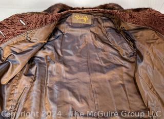 Brown Mink and Curly Lamb Swing Jacket With Three-Quarter Length Sleeves from Benioff's.