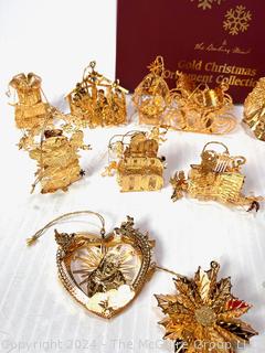 Box of Danbury Mint Gold Metal Christmas Ornaments