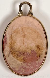 Rhodochrosite Cabochon Pendant in 12kt GF Bezel. 